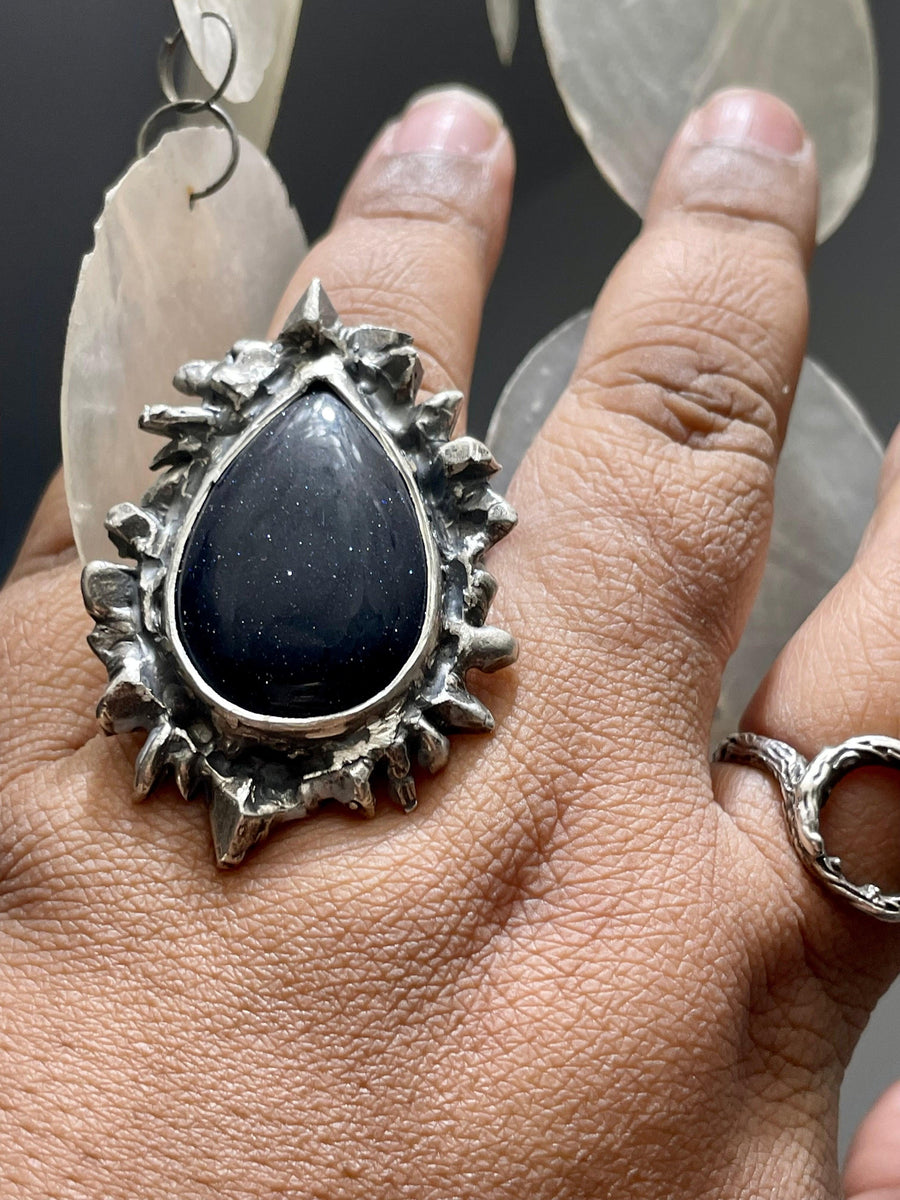 Galaxy Ice Portal Ring on finger showing Blue Sandstone. Textured ring Bohemian ring Statement ring Bold ring Large ring Sterling silver ring Unique ring Goddess ring Cosmic ring  Gemstone ring Blue Stone Ring Galaxy Ring