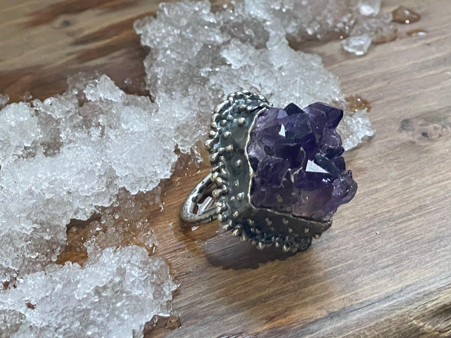 Glory Cluster Ring on wood top view. Ring (Size US 9). Glory Cluster Ring on ice. Textured ring Bohemian ring Statement ring Bold ring Large ring Sterling silver ring Unique ring Goddess ring Cosmic ring Gemstone ring Amethyst Ring Purple Stone Ring