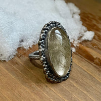 Grande Ring on wood side view.  Grande Ring on ice.  Grande Ring on finger. Textured ring Bohemian ring Statement ring Bold ring Large ring Sterling silver ring Unique ring Goddess ring Cosmic ring  Gemstone ring  Golden Rutile Ring Golden Stone Ring Quartz Ring