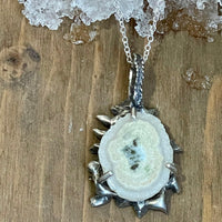 Ice Map Necklace lying in wood and snow background. Necklace Bohemian necklace Bold necklace Beautiful necklace Sterling silver necklace Goddess necklace Sexy necklace Textured necklace Statement necklace Unique necklace  Cosmic necklace White Solar Quartz Necklace