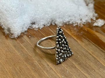 Triangle Droplet Ring on wood side view.  Triangle Droplet Ring on ice side view. Textured ring Bohemian ring Statement ring Bold ring Large ring Sterling silver ring Unique ring Goddess ring Cosmic ring